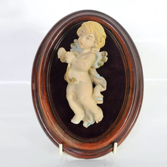 Angelo decorativo stile antico putto da parete con cornice ovale cherubino